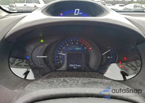 2013 Honda Insight from USA, damaged, VIN JHMZE2H38DS002364